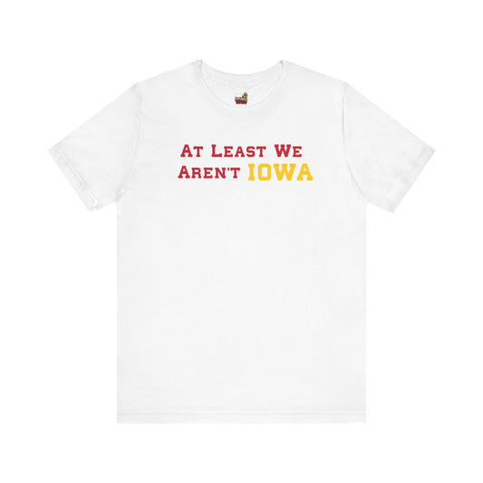 White t-shirt with text 'AT LEAST WE AREN'T IOWA' on a white background