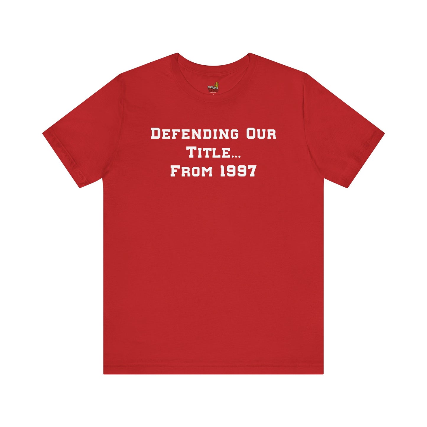Red t-shirt with white text 'DEFENDING OUR TITLE... FROM 1997' on a white background